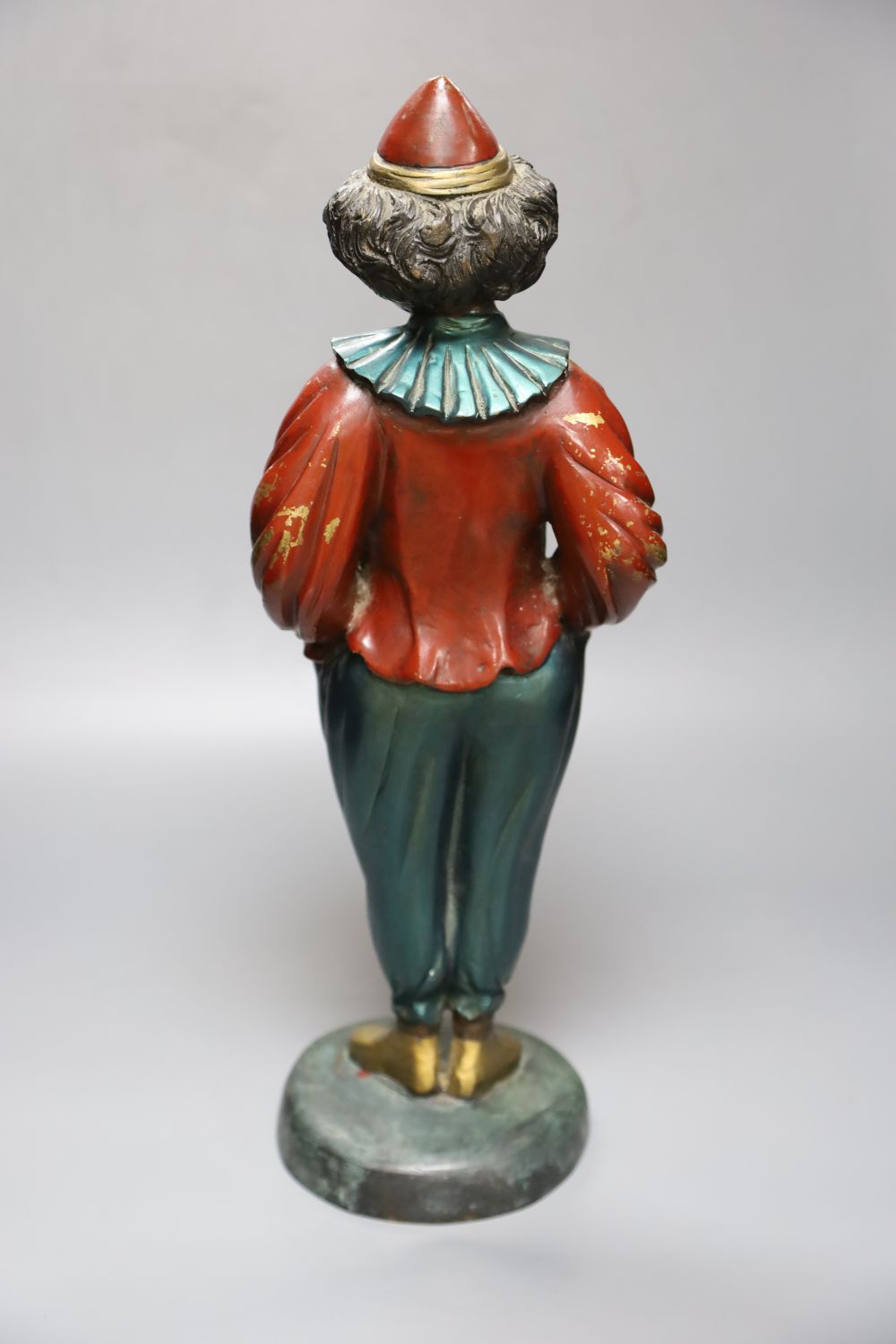 A modern painted bronze of a clown